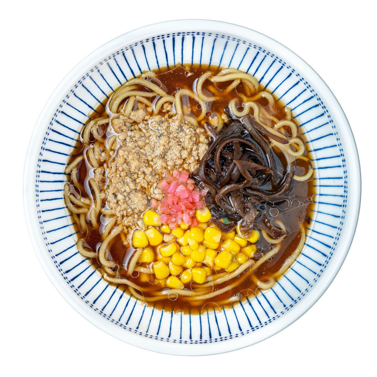 Chicken Shoyu Ramen with scratch-made noodles, real bone broth, ground chicken, sweet corn, ginger, and seasoned wood ear mushrooms in a white bowl.