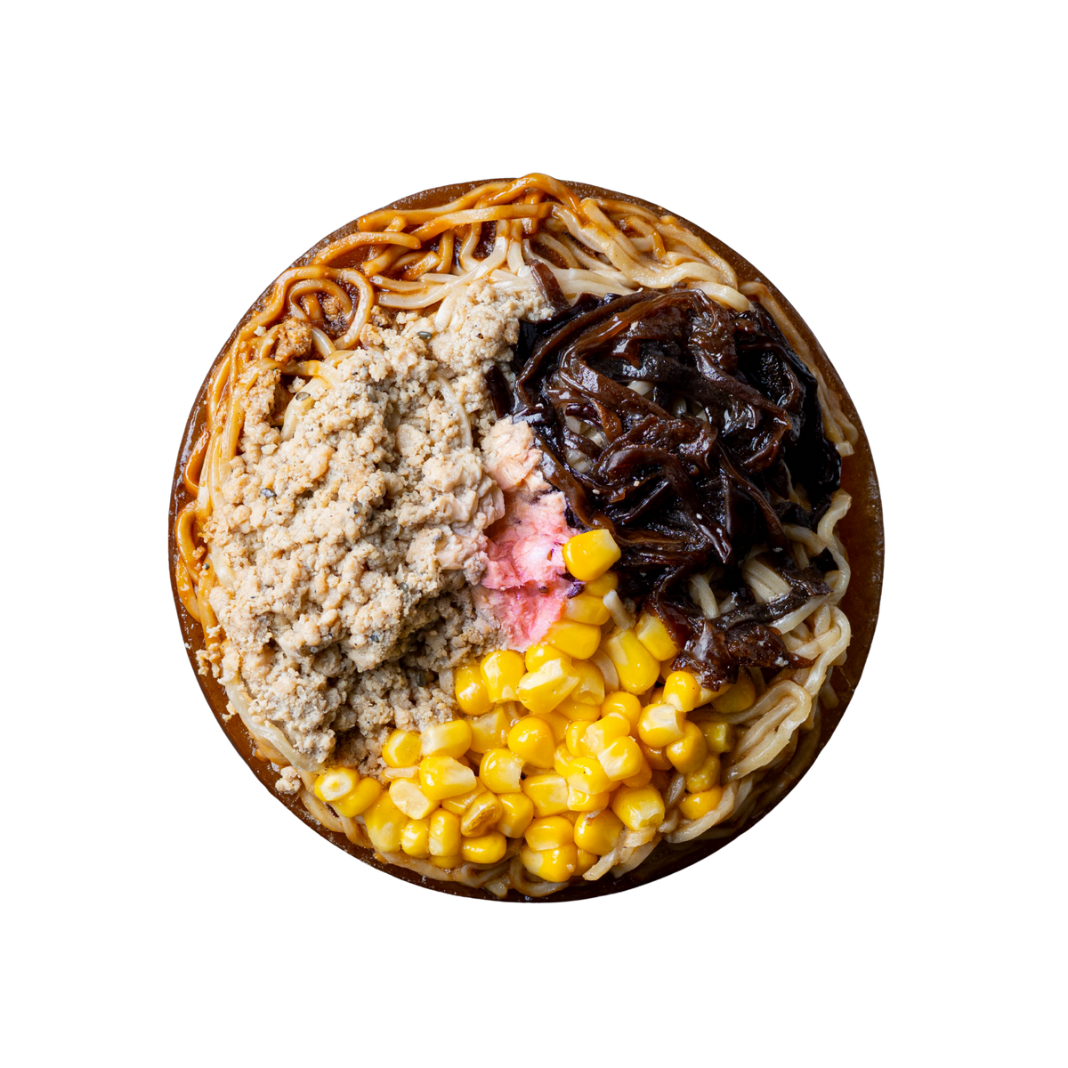 A top-down view of a round bowl of Chicken Shoyu Frozen Ramen with various toppings, including real bone broth, scratch-made noodles, sweet corn kernels, seasoned wood ear mushrooms, garlic, and ground chicken, isolated on a white background.