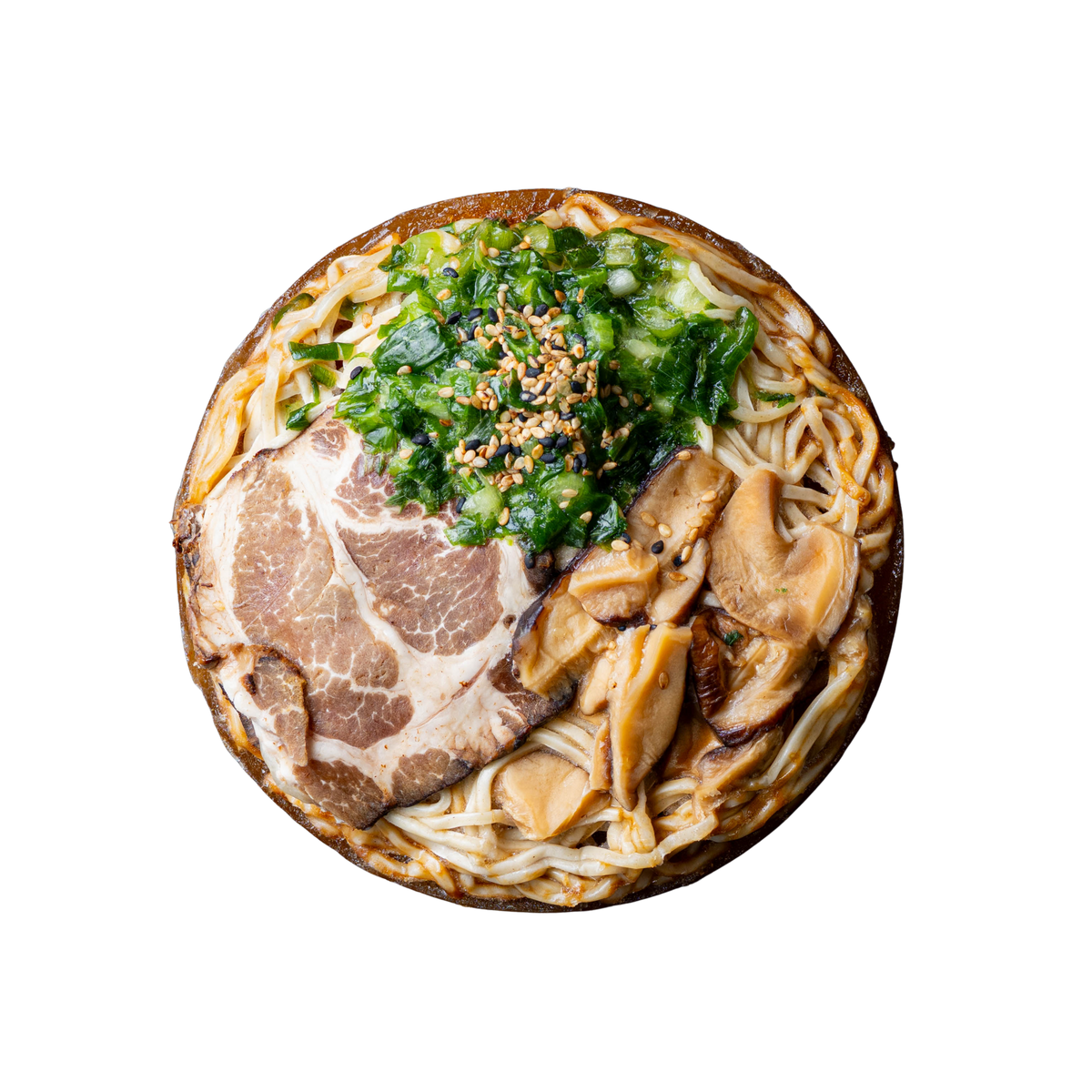 A top-down view of a round bowl of Shiitake Pork Shoyu Frozen Ramen with various toppings, including real bone broth, scratch-made noodles, sliced pork chashu, seasoned shiitake mushrooms, green onions, and sesame seeds isolated on a white background.