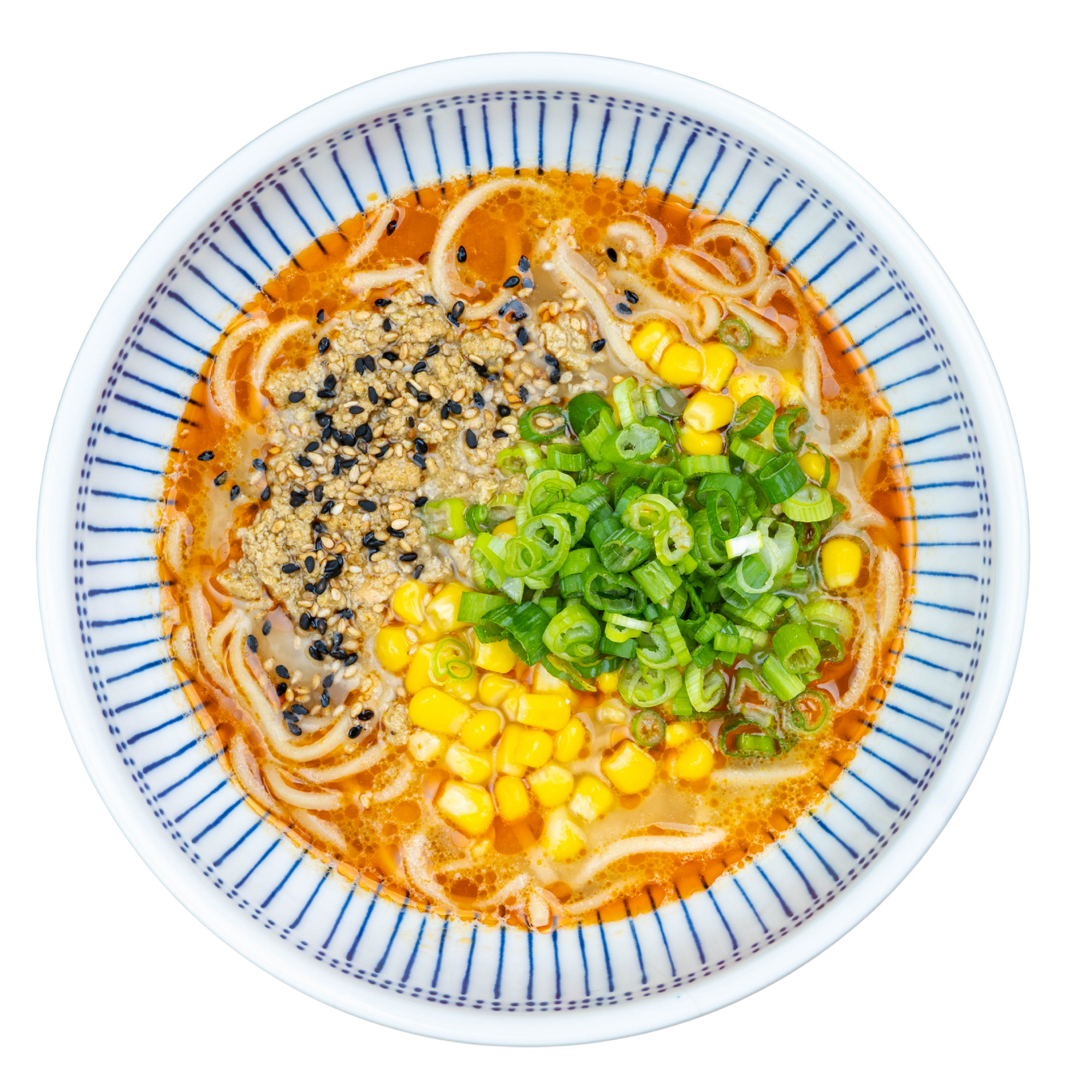 Spicy Chicken Tantanmen Ramen with scratch-made noodles, real bone broth, chili oil, ground sesame chicken, sweet corn, and green onions in a white bowl.