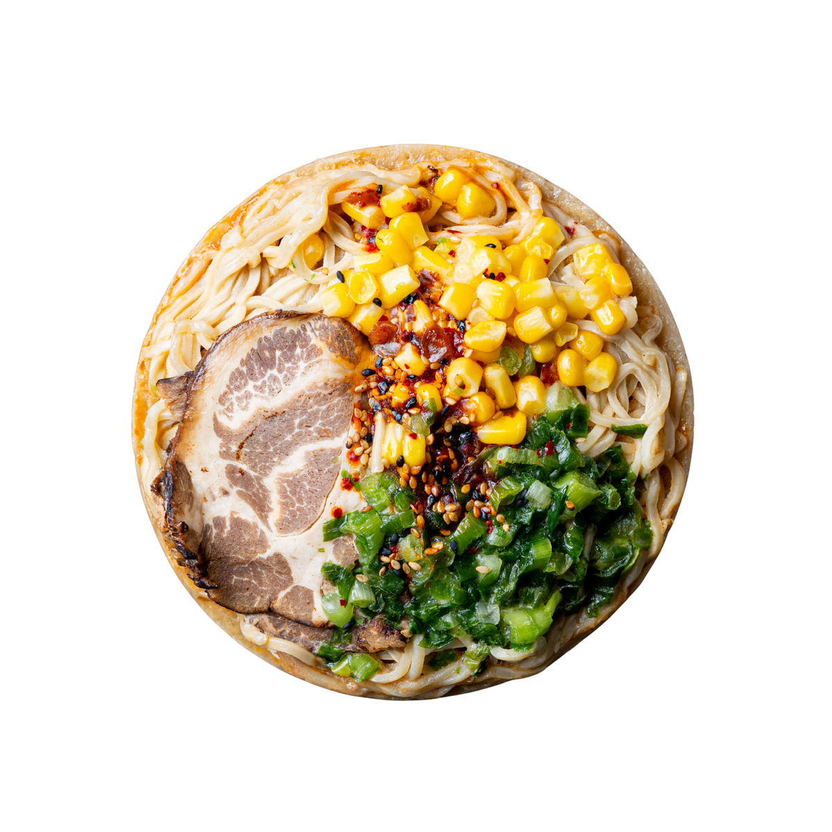 A top-down view of a round bowl of Spicy Pork Miso Frozen Ramen with various toppings, including real bone broth, scratch-made noodles, sliced pork chashu, sweet corn, green onions, and chili crunch, isolated on a white background.